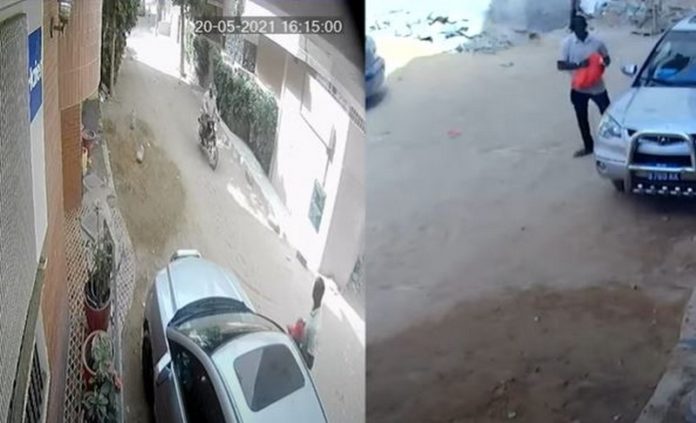 Caméras de surveillance : Deux voleurs cassent une voiture et prennent une grosse somme d'argent